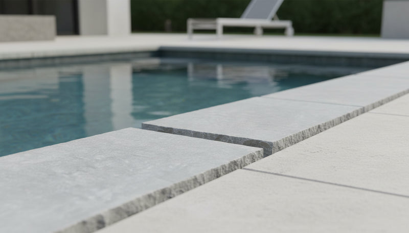 Close-up of Natural Indian Bluestone Limestone Tumbled & Brushed 12 x 24 x 2 Modern Coping, in Natural tones.