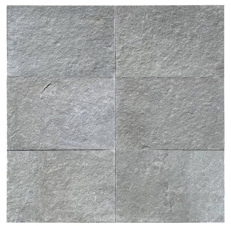 Close-up of Natural Indian Bluestone Limestone Tumbled & Brushed 16 x 24 x 2 Modern Coping, in Natural tones.