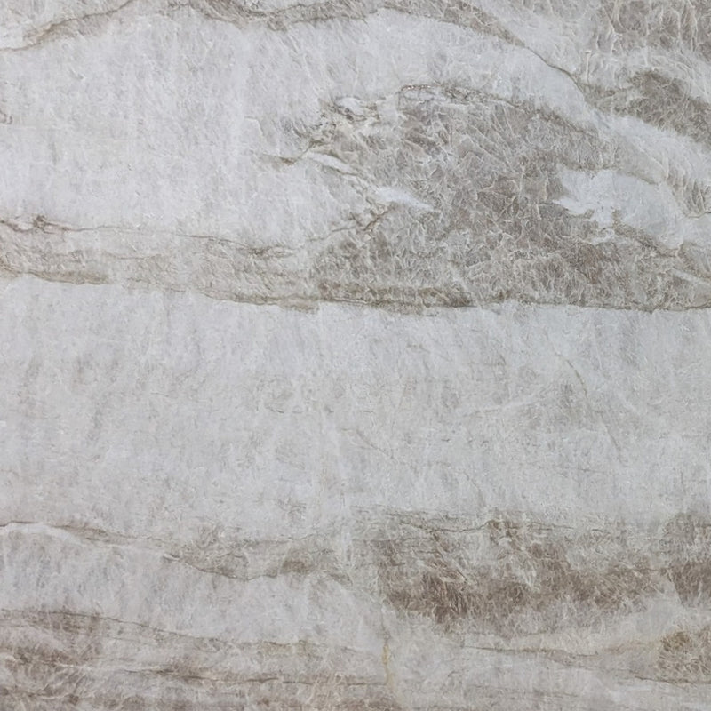 Perla Santana quartzite with a light grey base and flowing taupe veins.