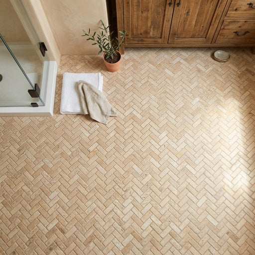 Philadelphia Travertine 1x2 Tumbled Travertine Herringbone Mosaic — Bathroom floor