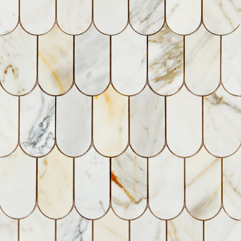 Piano Calacatta Gold 1x2 polished marble mosaic in a full-frame staggered scallop pattern with white, cream, gold, and gray veining.