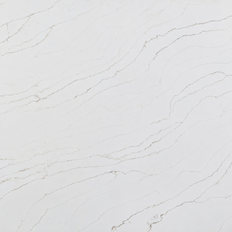 Pietra Danali Danae 127x64 2cm polished quartz slab with a soft white background and delicate gray-beige veining.