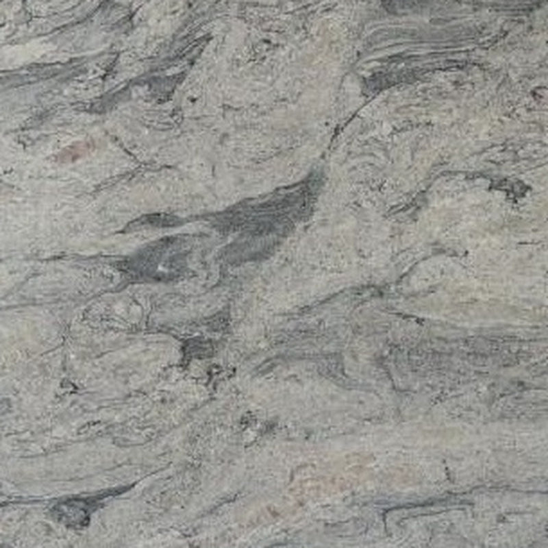 Close-up of Piracema White granite with a light gray surface and flowing dark gray veins.