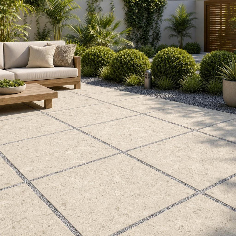 Platinum Ice 24x24 Tumbled Limestone Paver — Backyard patio