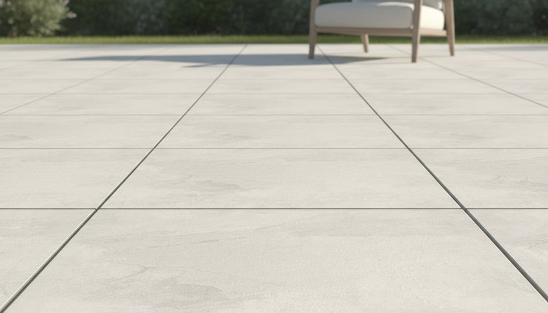 Close-up of De White Porcelain Rough & Straight Edge 24 x 24 x 3/4 Paver, in White tones.