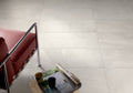 Close-up of Tivoli Beige Porcelain Rough & Straight Edge 24 x 24 x 3/4 Paver, in Beige tones.