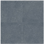 Close-up of Bluestone Dark Grey Porcelain Rough & Straight Edge 24 x 24 x 3/4 Paver, in Grey tones.