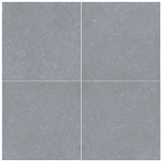 Close-up of Bluestone Light Grey Porcelain Rough & Straight Edge 24 x 24 x 3/4 Paver, in Grey tones.