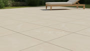 Close-up of Conrad Ivory Porcelain Rough & Straight Edge 24 x 24 x 3/4 Paver, in Ivory tones.