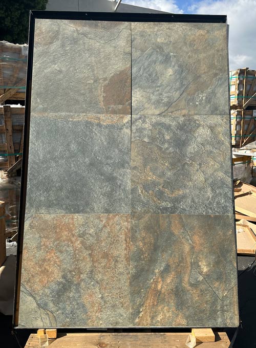 Close-up of Natural Harmony Slate Porcelain Rough & Straight Edge 24 x 24 x 3/4 Paver, in Natural tones.