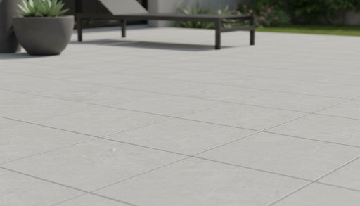 Close-up of Astro Grey Porcelain Rough & Straight Edge 24 x 24 x 3/4 Paver, in Grey tones.