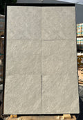 Close-up of Astro Grey Porcelain Rough & Straight Edge 24 x 48 x 3/4 Paver, in Grey tones.