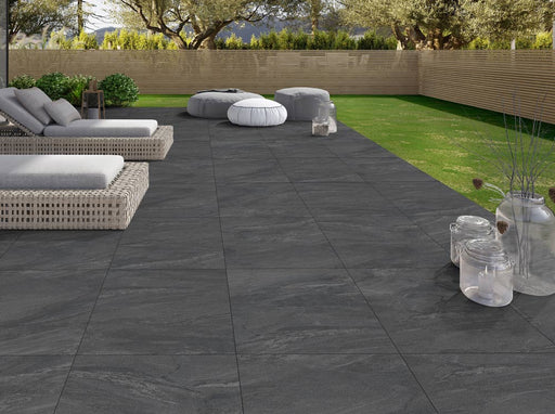 Close-up of Grey Owl Porcelain Rough & Straight Edge 24 x 48 x 3/4 Paver, in Grey Owl tones.