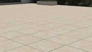 Close-up of Sierra Cream Porcelain Rough & Straight Edge 24 x 24 x 3/4 Paver, in Cream tones.