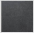 Close-up of Natural Envy Dark Porcelain Rough & Straight Edge 24 x 24 x 3/4 Paver, in Natural tones.