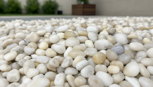Close-up of White Stone Polished 2 - 5CM (3/4 - 2 Inch) Medium White Ultra Pebbles, in White tones.