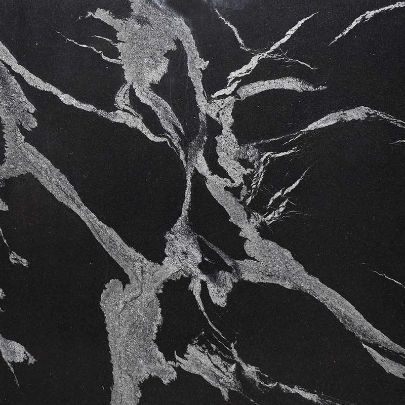 Python Black 3cm polished granite slab with a black surface and bold branching silver-gray and white veins.