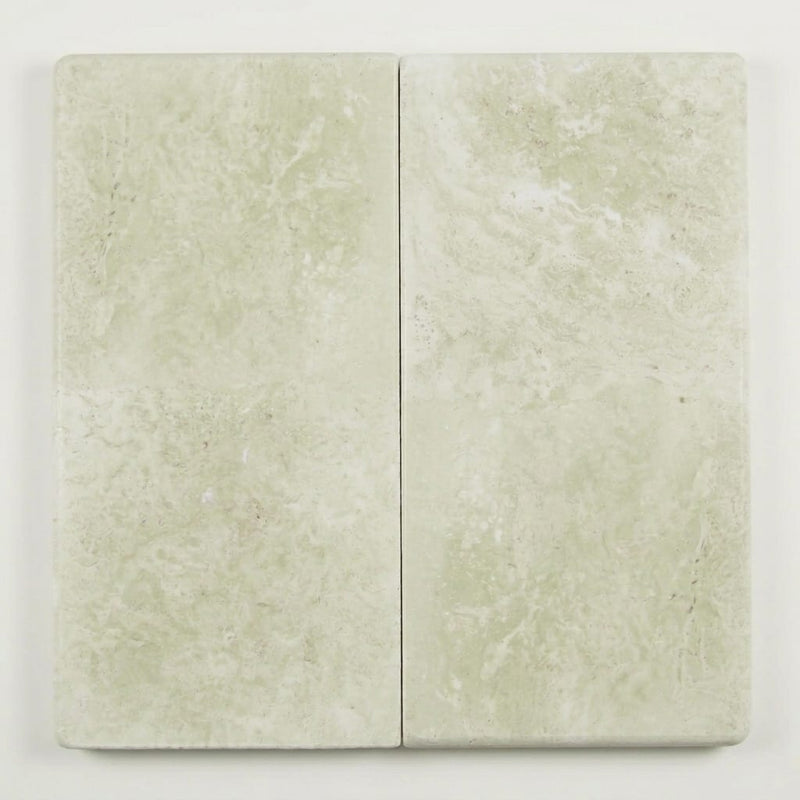 QDI Light 12x24x2 Tumbled Travertine Single Bullnose Pool Coping close-up