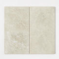 QDI Light 12x24x2 Unfilled & Honed Beveled Travertine Pool Coping close-up