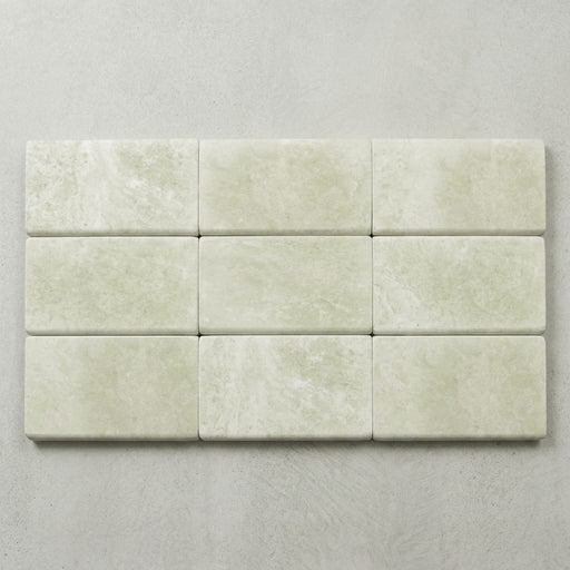 QDI Light 6x12 Tumbled Travertine Single Bullnose Pool Coping close-up