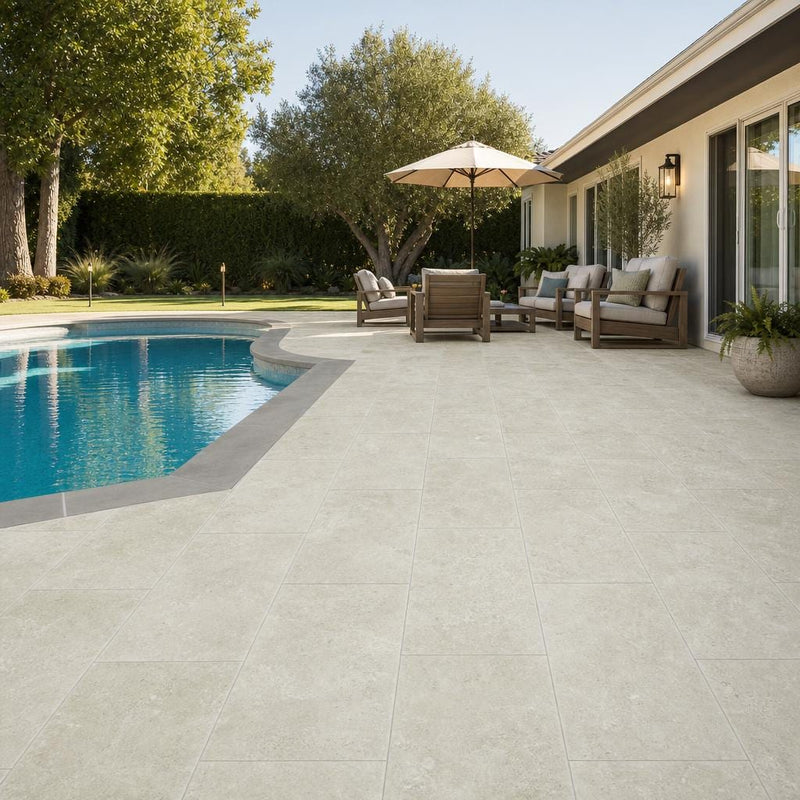 Qdi Light Travertine Paver 12x24 Tumbled 2 inch — Backyard pool deck