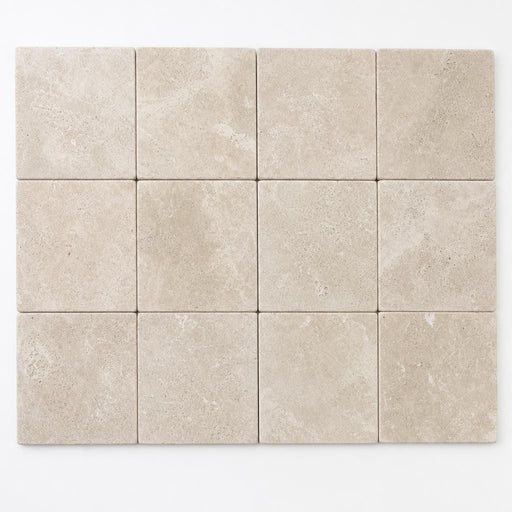Qdi Light Travertine Paver 6x6 Tumbled 1.25 inch close-up