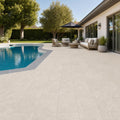 QDI Pearl 12x24x2 Sandblasted Marble Paver — Backyard pool deck