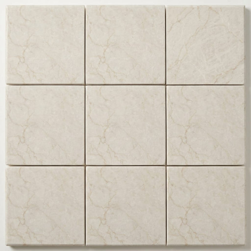 Qdi Pearl Marble Coping 12x12 Tumbled Bullnose 1.25 inch close-up
