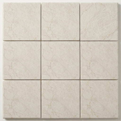 Qdi Pearl Marble Coping 12x12 Tumbled Bullnose 1.25 inch close-up