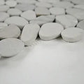 Rio Lago Sliced Truffle Pebbles Mesh Backed Pattern Tumbled Marble Mosaic Tile