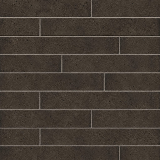 Rondine Nolita Charcoal 2x18 matte porcelain tiles with a rustic charcoal texture arranged in horizontal rows.