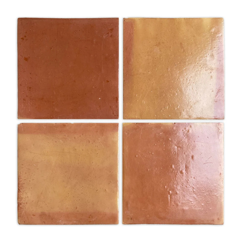 Four square Saltillo terracotta tiles with natural red and golden color variation.