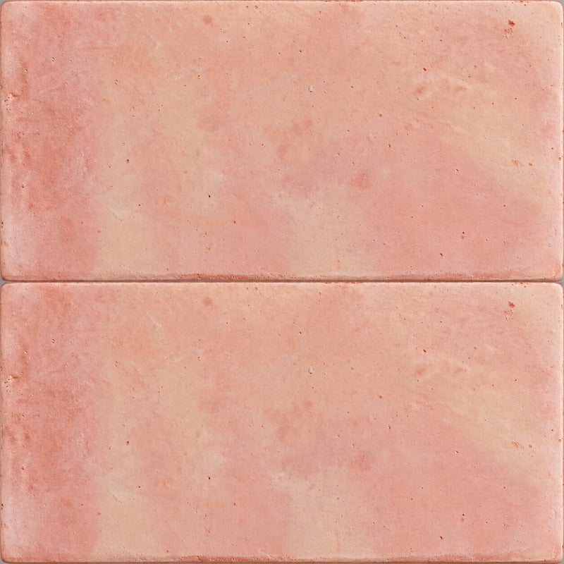 Saltillo Regular 4x8 natural terracotta pavers with soft peach tones, subtle surface texture, and rounded edges.