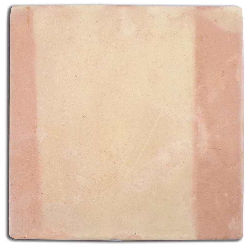 Saltillo Super round edge terracotta paver with warm salmon and golden clay tones, softly rounded corners and gentle natural surface variation.
