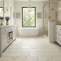 Shell Stone Limestone Veneer 12x24 Splitface tile — Primary Bath floor