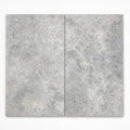 Silver 12x24x2 Unfilled & Honed Travertine Beveled Pool Coping close-up