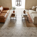 Silver (Pewter Blend) Travertine 18x18 Unfilled, Brushed & Chiseled Travertine Tile — Family Room floor