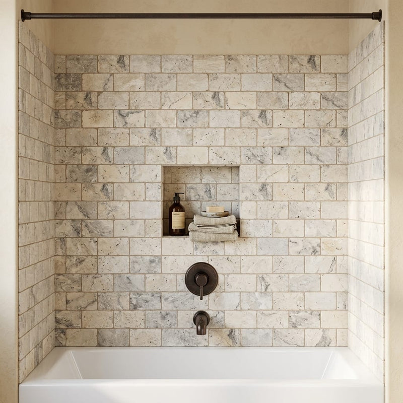 Silver (Pewter Blend) Travertine 3x6 Tumbled Travertine Tile — Bathroom tub surround