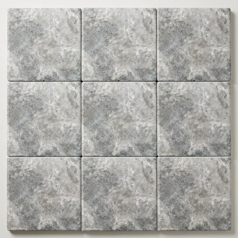 Silver Travertine Coping 12x12 Tumbled Bullnose 1.25 inch close-up
