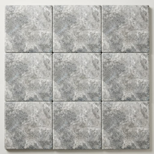 Silver Travertine Coping 12x12 Tumbled Bullnose 1.25 inch close-up