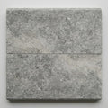 Silver Travertine Coping 12x24 Filled, Honed Bullnose 1.25 inch close-up