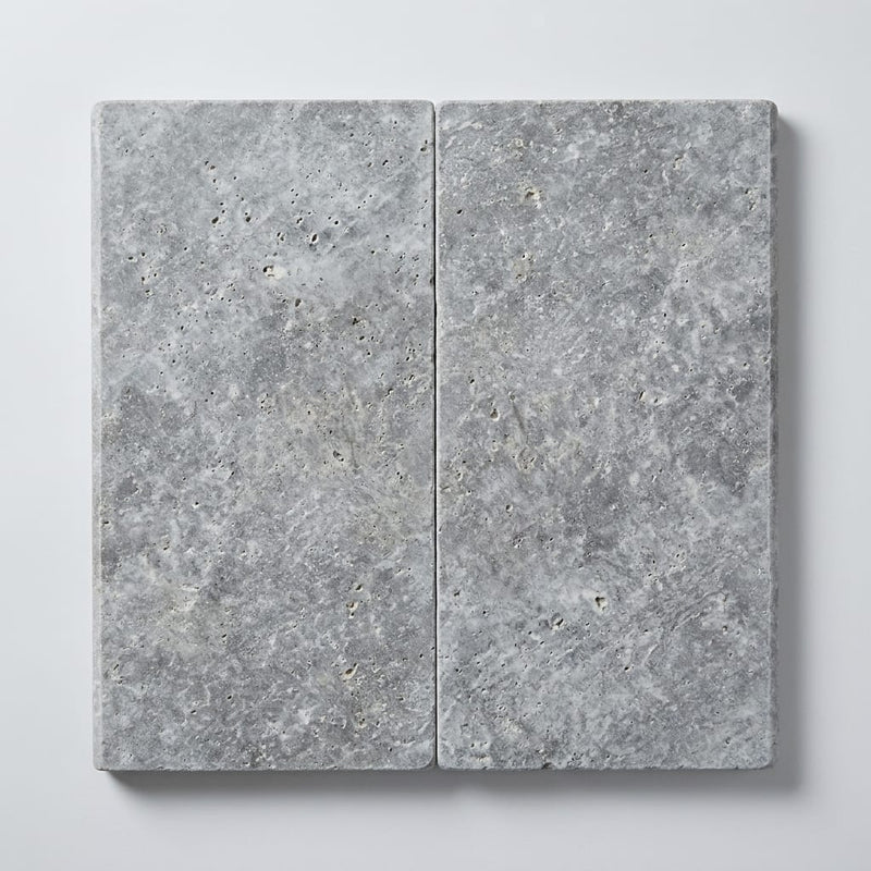 Silver Travertine Coping 12x24 Tumbled Bullnose 1.25 inch close-up
