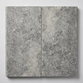 Silver Travertine Coping 12x24 Unfilled, Honed Bullnose 1.25 inch close-up