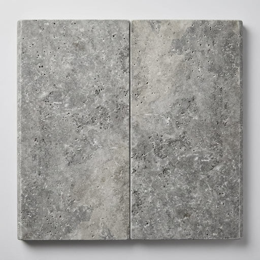 Silver Travertine Coping 12x24 Unfilled, Honed Bullnose 1.25 inch close-up
