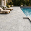 Silver Travertine Paver | Unfilled Chiseled | Grey | 12x12 in — Backyard pool deck