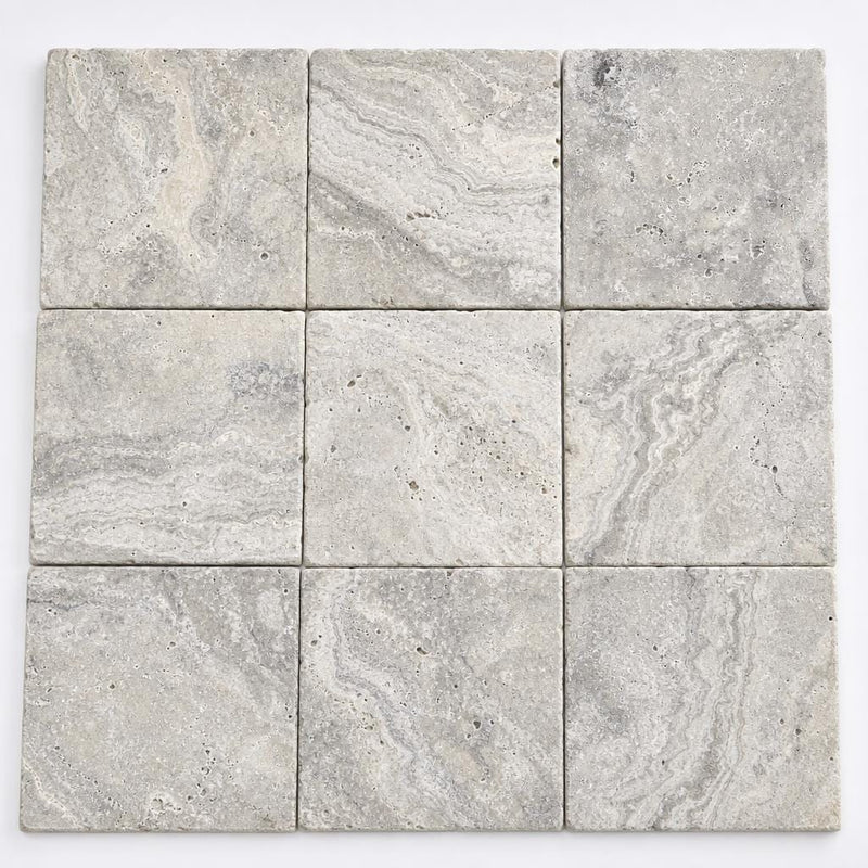 Silver Travertine Paver | Unfilled Chiseled | Grey | 12x12 in close-up