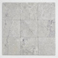 Silver Travertine Paver 12x12 Unfilled Chiseled 2 inch close-up