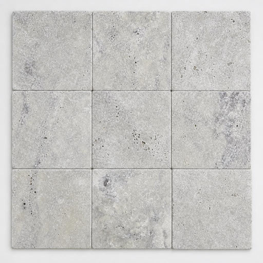 Silver Travertine Paver 12x12 Unfilled Chiseled 2 inch close-up