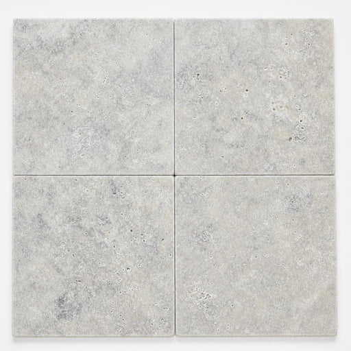 Silver Travertine Paver 16x16 Tumbled 1.25 inch close-up