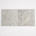 Silver Travertine Paver 24x24 Tumbled 1.25 inch close-up